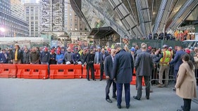 Trump stops at NYC construction site before heading to court