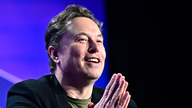 Elon Musk celebrates first self-driving delivery of a Tesla to customer - Fox Business News
