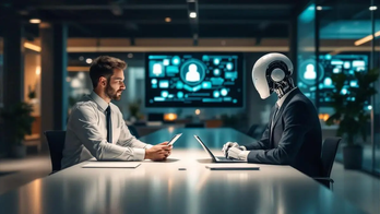 Experts warn AI disruption is hitting the office, but predict a massive ‘productivity boom’ for US workers