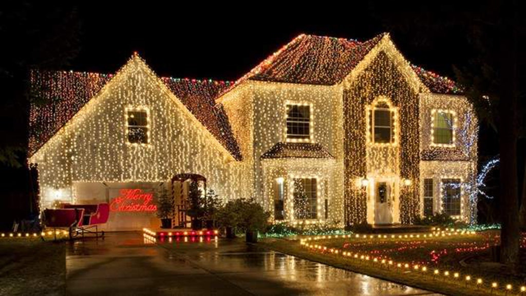 Man reacts after winning 4-year battle over his home's Christmas lights