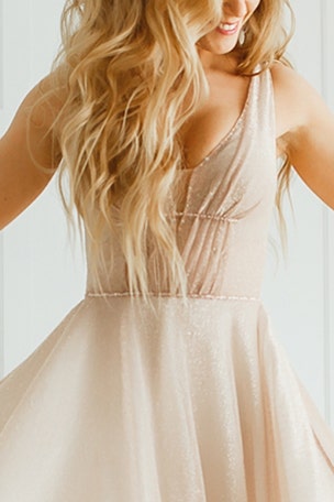 Bride upset about friend's boob job