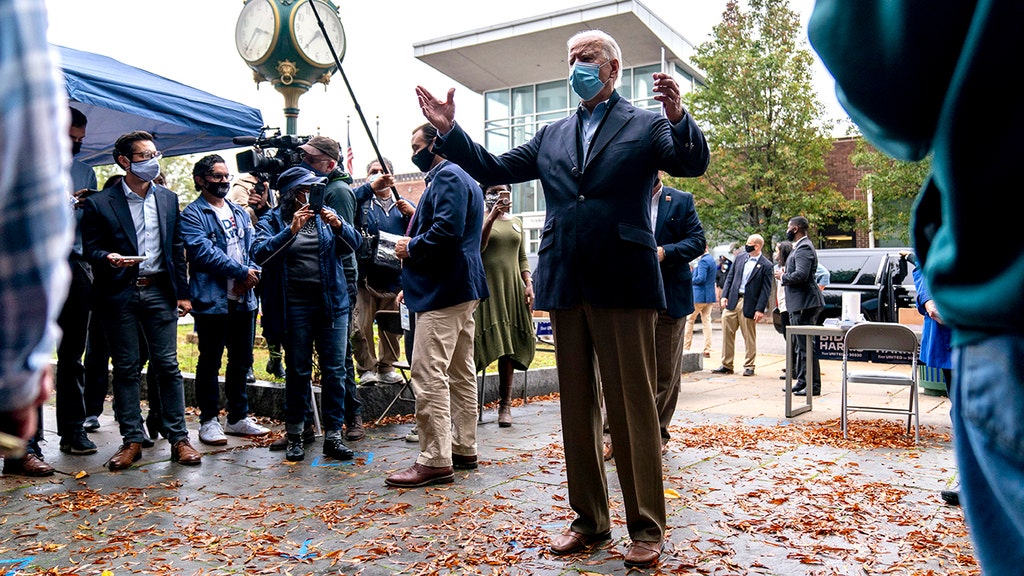 Biden takes rare questions from reporters at campaign stop