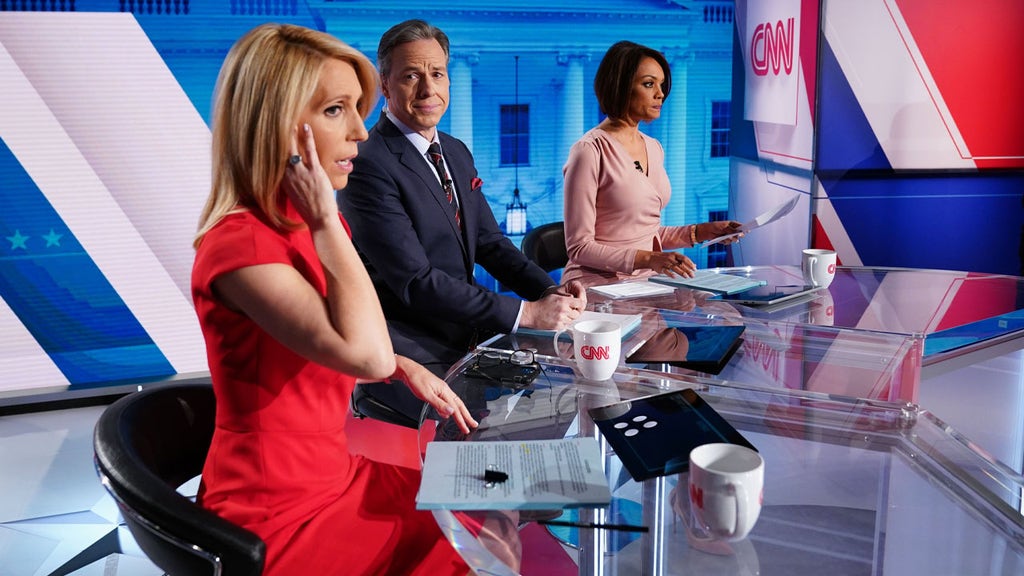 CNN anchors let insults, condemnations fly as Trump leaves the White House