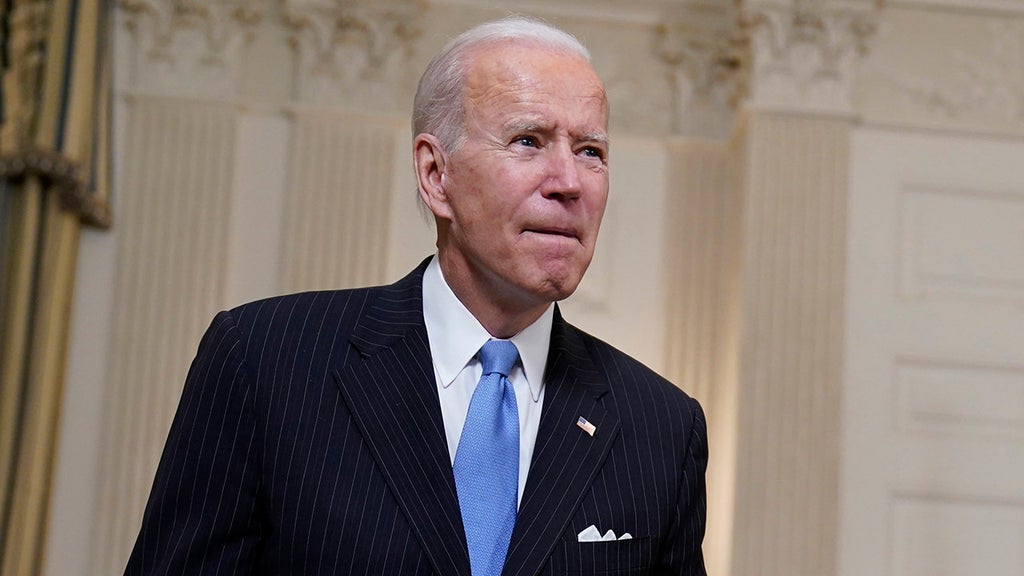 Biden tightens limits for COVID checks as he gets pushback from moderates