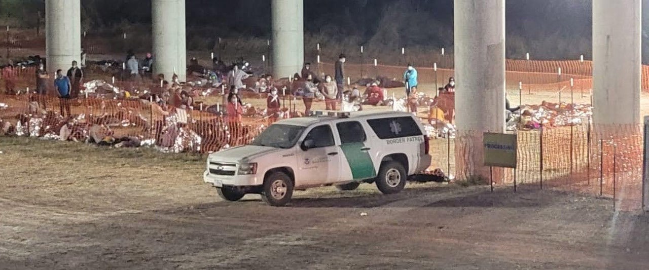 Exclusive pics show migrants at TX processing site, as Biden dodges reality of situation