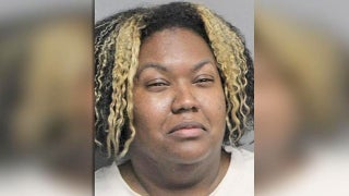 Woman arrested for refusing to return $1M accidentally deposited into account