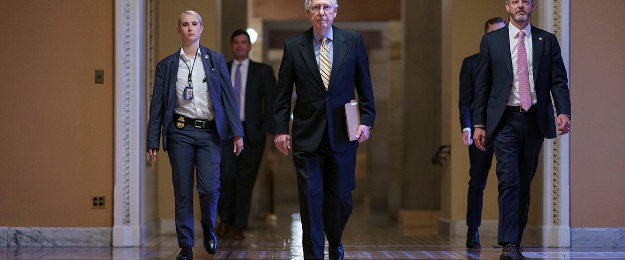 Republicans use filibuster to stop debate on 'rotten' election reform bill as Harris presides