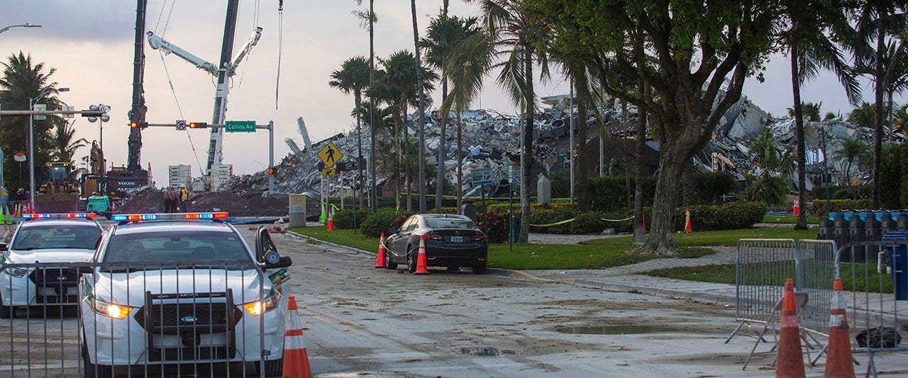 Search crews return to Florida condo site after demolition as officials acknowledge 'dimmer' outlook