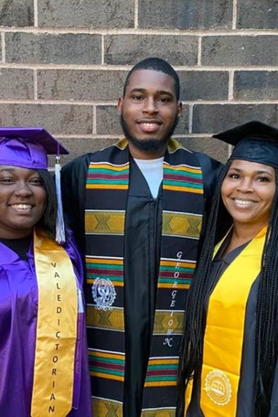 Family graduates, including MOM