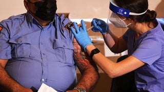 Vaccine mandates for government workers facing growing union backlash