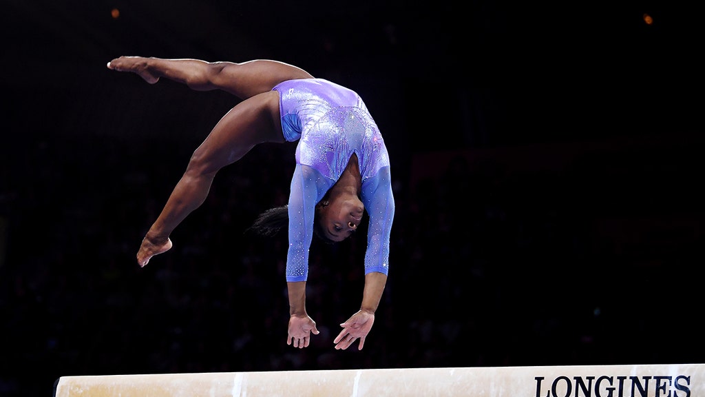 Simone Biles says she'll compete in the balance beam finals in Tokyo