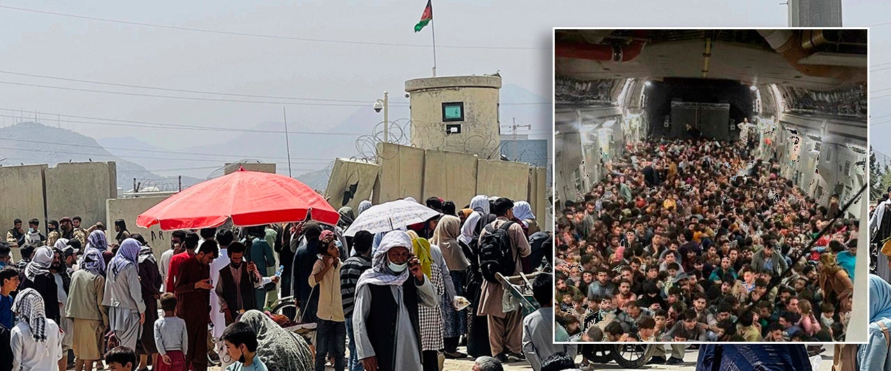 Taliban forms 'ring' outside Kabul airport as photo of Afghans packed on US military cargo plane emerges