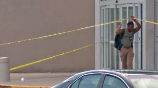 georgia mall shooting-crossing yellow tape