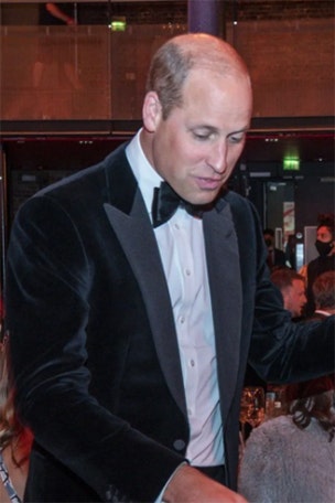 Prince William rubs elbows with celebs