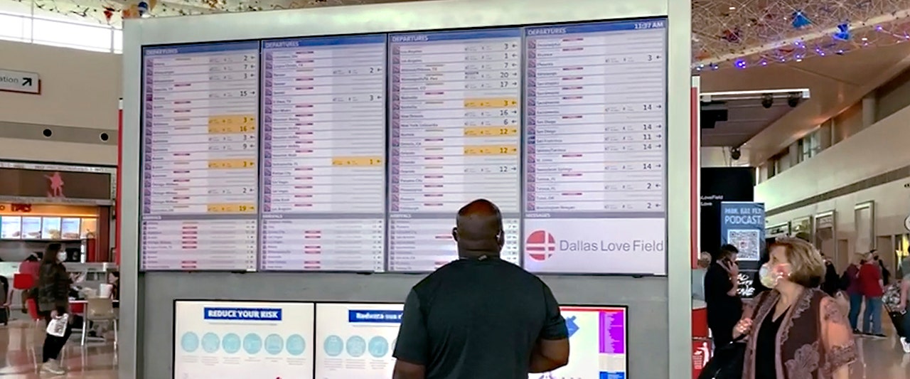 guy looking at board