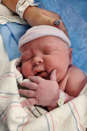 Woman gives birth to 14-POUND baby