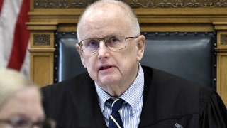 Judge condemns media outlet after person taken into custody for following Rittenhouse jury bus reveals affiliation
