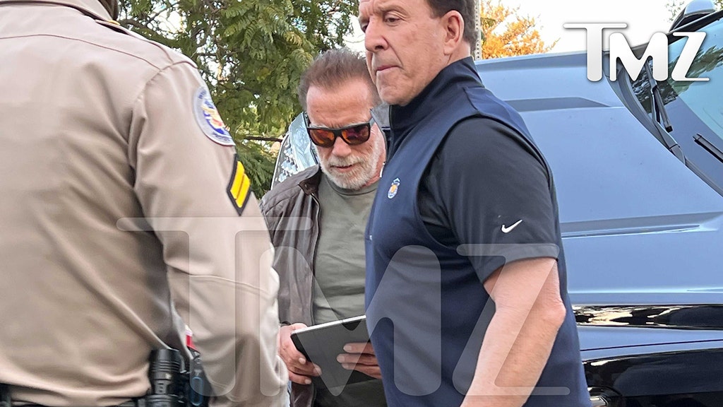 Arnold Schwarzenegger's monster SUV rolls on top of Prius in serious accident