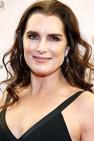 Shields poses TOPLESS for ad