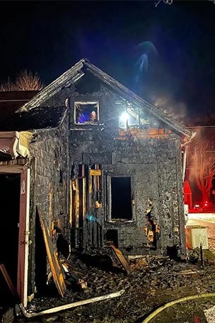Dog rescued from BURNING house