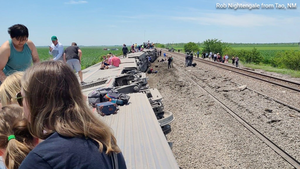 Injuries reported as Amtrak train derails after hitting dump truck
