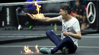 Climate change protester interrupts Laver cup, lights arm on fire