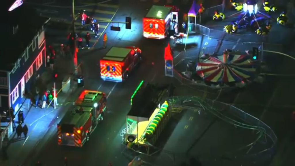 At least six injured after car plows into street carnival