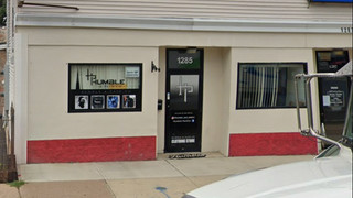 Store owner turns tables on armed robbers after getting shot in the back