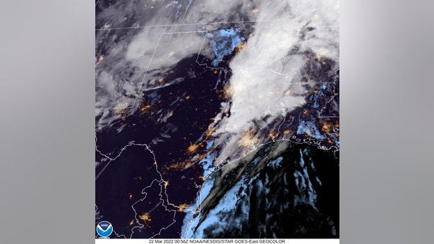 Satellite shows storms continue as night falls