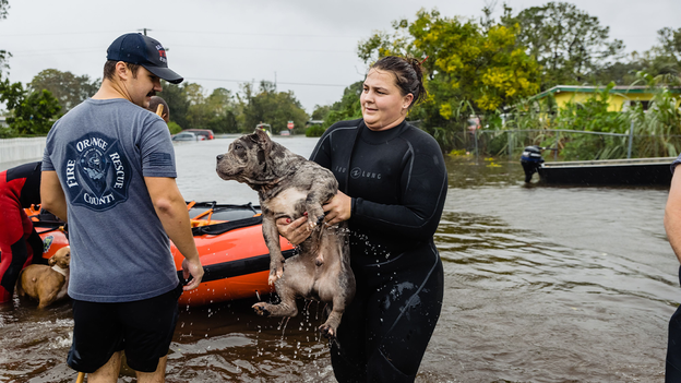 Photos: First responders save beloved pets from floodwaters in Orange County, Florida