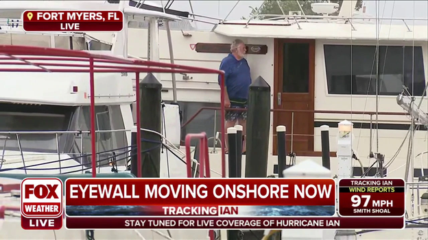 Man spotted standing on boat in Fort Myers as Hurricane Ian's eyewall begins to move onshore