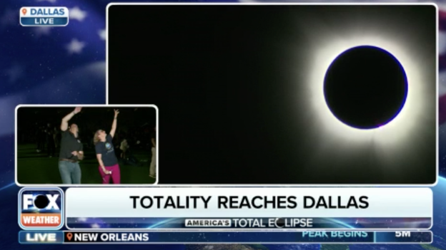 Dallas in darkness as total solar eclipse underway