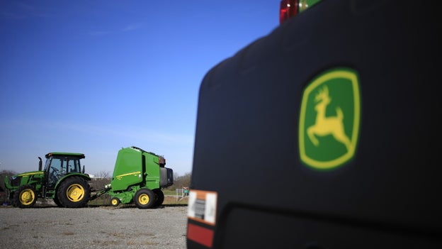 Deere lifts profit view on price hikes, strong farm equipment demand