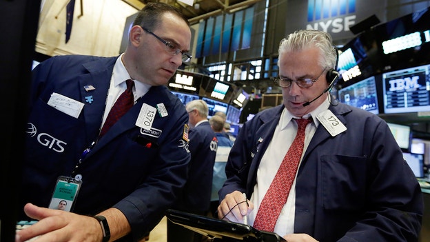 Stock futures trade cautiously to end the week