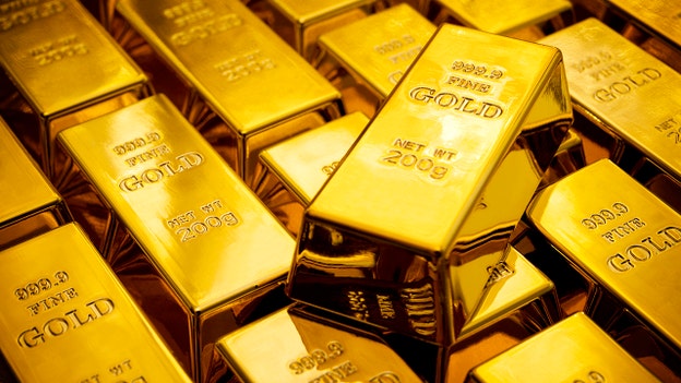 Gold lower early Tuesday