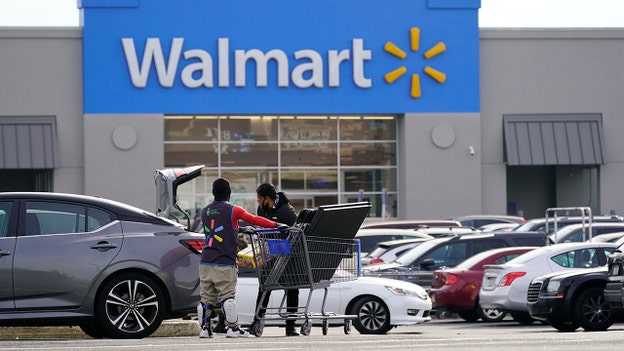 Walmart boosts outlook