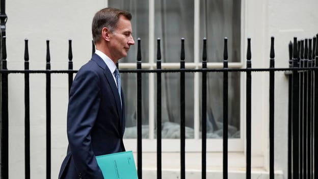 UK chancellor Jeremy Hunt hikes taxes, squeezes spending to restore markets' faith