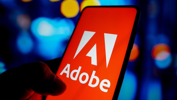 Adobe profit beat, revenue rises