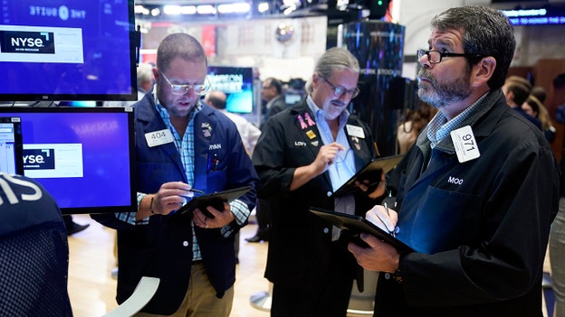 US stocks higher early Tuesday after a year of big declines