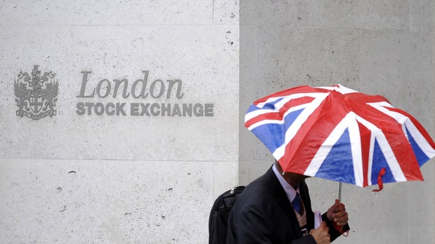 London's FTSE 100 tops 8,000 reaching record high