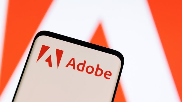 Adobe tops Wall Street expectations