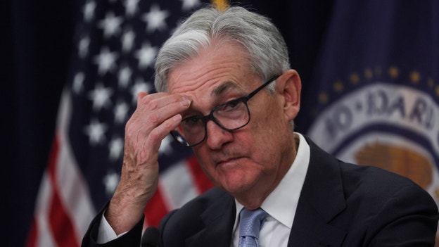 Fed warns of mild recession