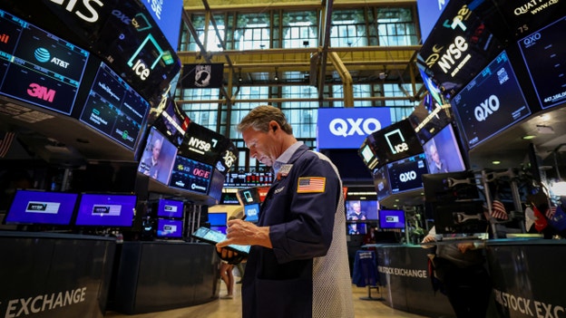 Stocks close higher as investors shake off US credit downgrade