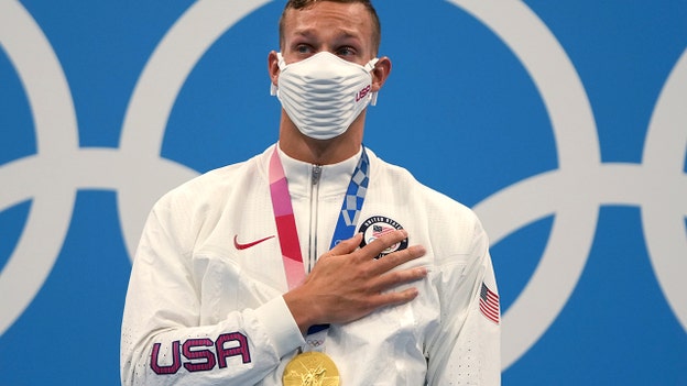Olympian Caeleb Dressel tears up on gold medal stand while national anthem plays