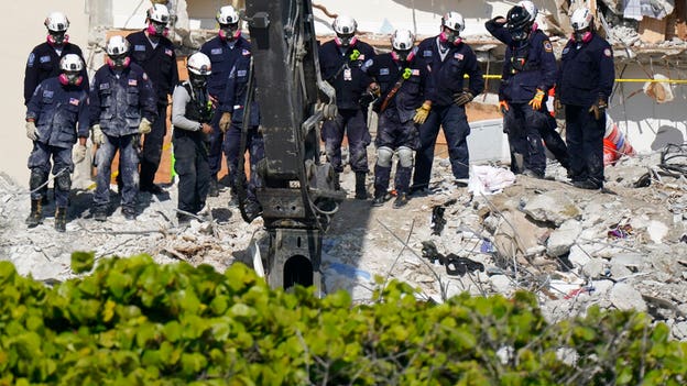 Grieving firefighter recovers his own child’s body from rubble of Florida condo collapse