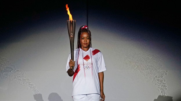 Naomi Osaka reacts to Olympic games cauldron lighting