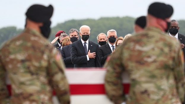 President Biden receives bodies of fallen troops at Dover Air Force Base