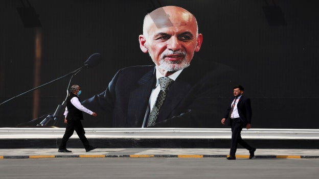 Deposed Afghan president Ghani made snap decision in 'minutes' to flee as Taliban entered Kabul