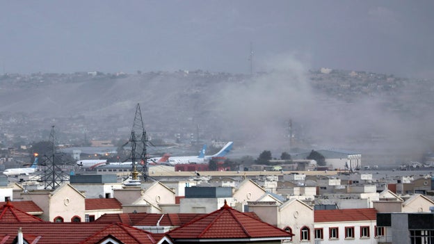 Photo shows smoke rising from Kabul airport following explosion
