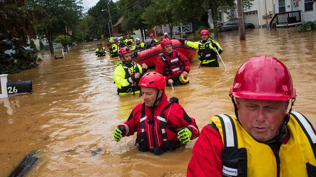 Rescue officials assist residents as Henri moves across Northeastern seaboard